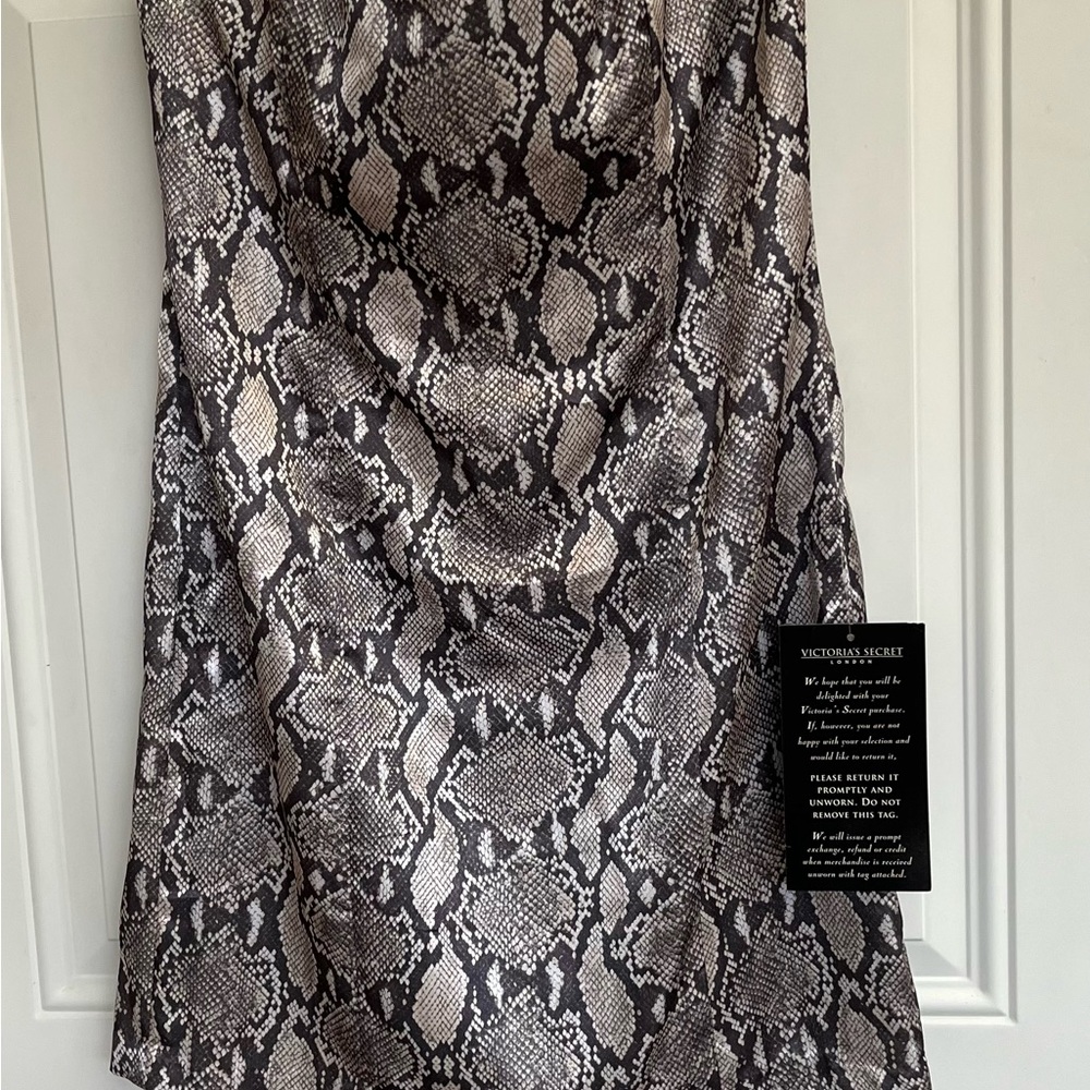 Victoria’s Secret London sexy dress by Hugo Buscati Snake skin pattern. Size 10
